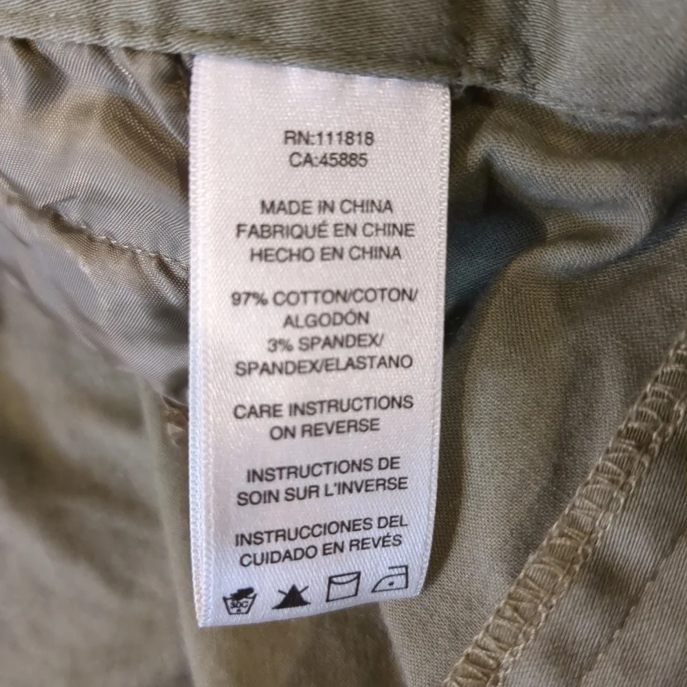 Michael Kors green Bermuda zipper pocket shorts , size 6